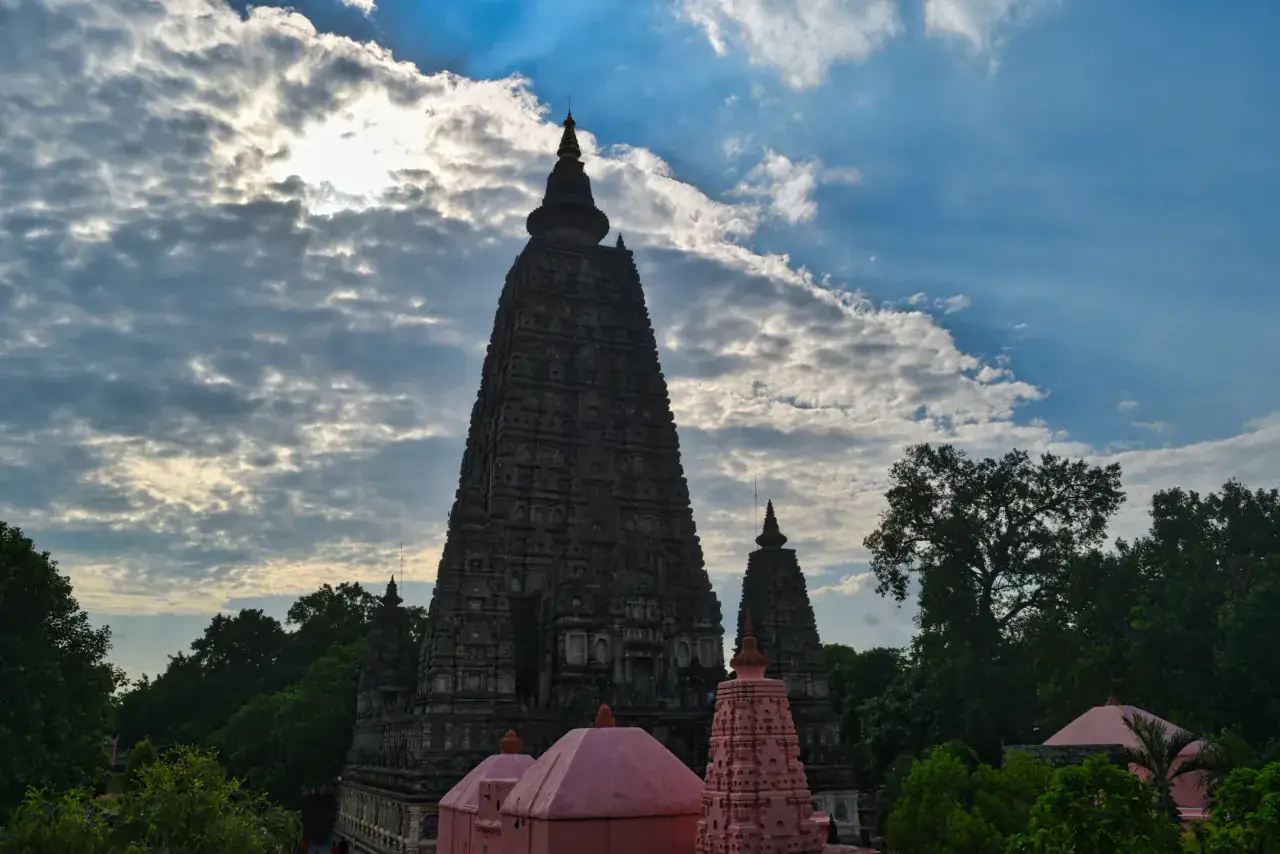 Mahabodhi Temple illuminated at dusk in Bodhgaya