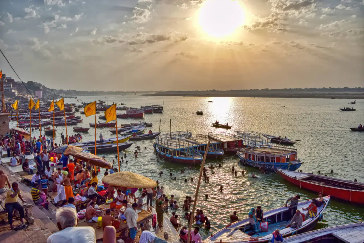 Boats and the Varanasi ghats in the soft light of dawn