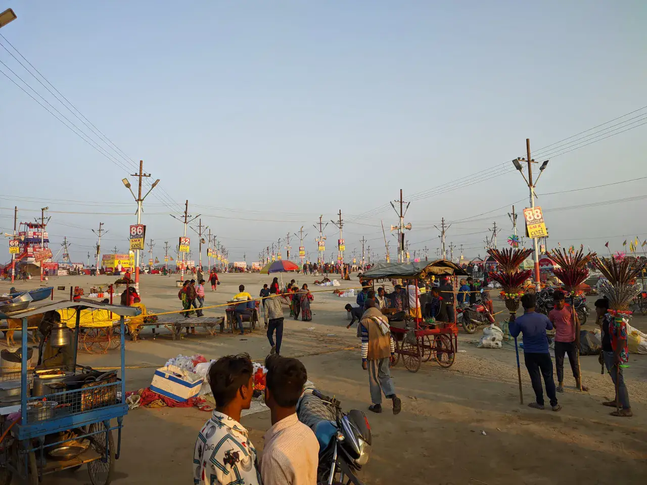 Pilgrims gathered on the Sangam sands in Prayagraj