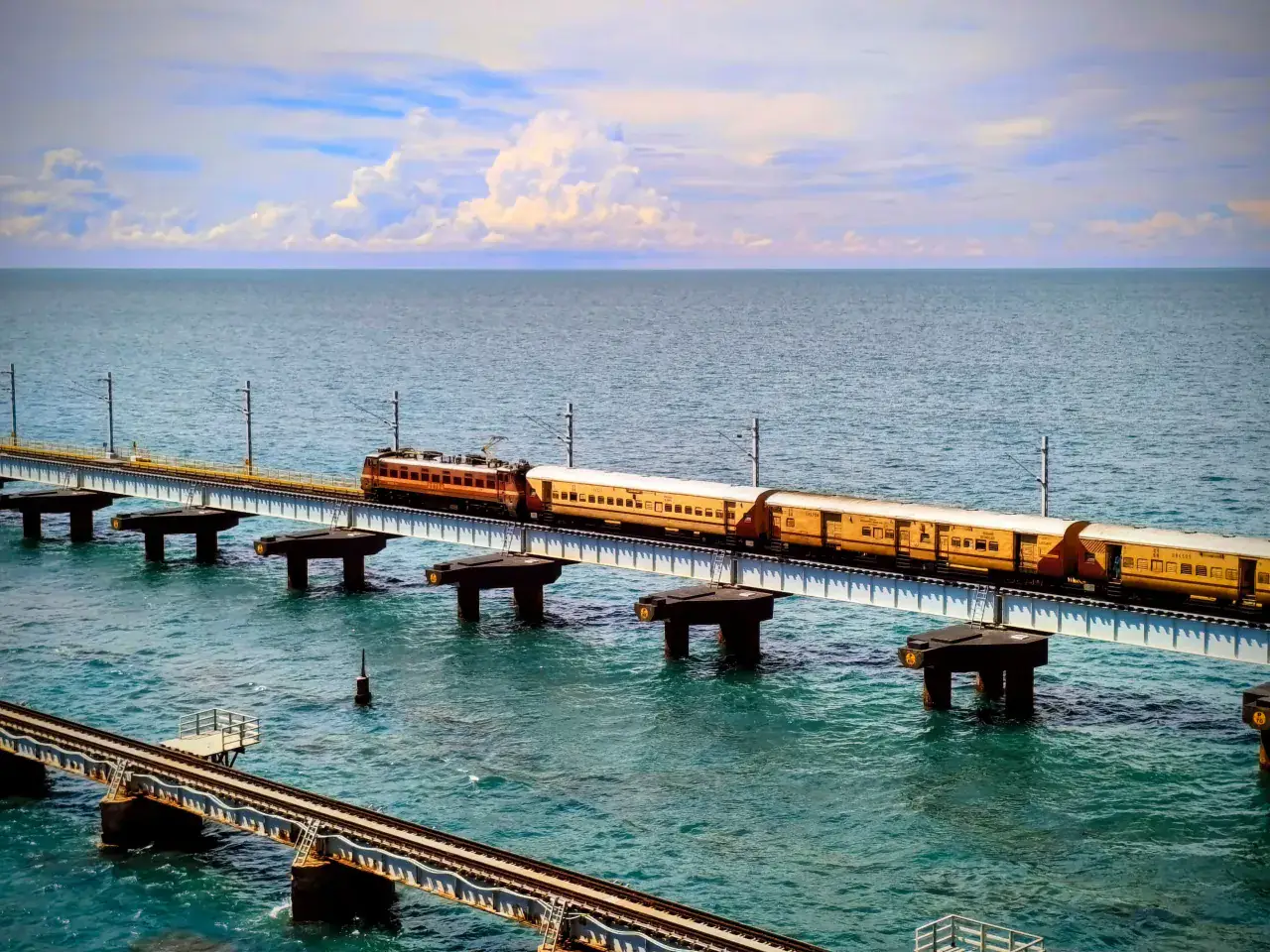 A train crossing the Pamban railway bridge over the sea
